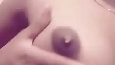 Shower room is a place where the young Desi porn model squeezes tits