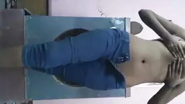 In this sex video slim Desi teen shows her tits and hairy XXX peach