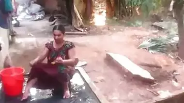 Chubby Indian temptress loves her sex hole and washes it in a trough