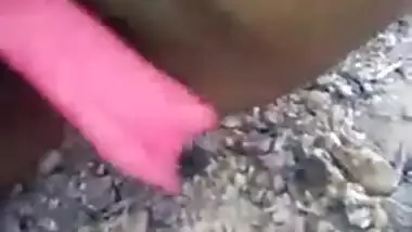 Pretty Desi harlot comes to the field to show her hairy XXX twat