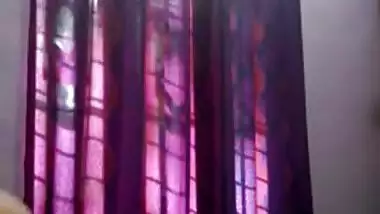 Tempting teen Desi lies down on her back to rub XXX body for sex show