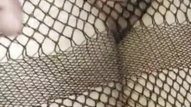 Hot Desi babe in fishnet dress has her pussy XXX rubbed by lover