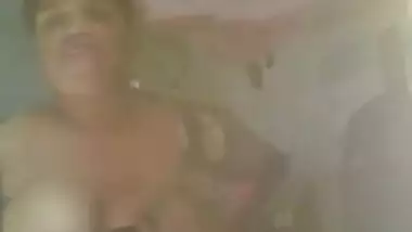 Middle-aged whore of India gladly takes her XXX tits out of clothes