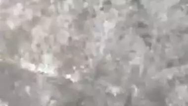 MILF dries hair and body outdoors being filmed by an Indian perv