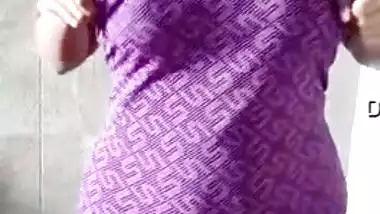 Desi slut takes off swimsuit to show her XXX tits in the mirror