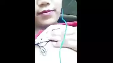 Beautiful teen plays with her firm boobs while on a video call with lover