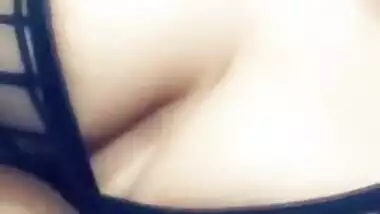 Indian babe's breasts are so big that she can easily lick nipples