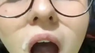 Cute Girl With Glasses Takes Cum All Over Her Face And In Mouth