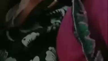 Aunty with perfect pussy lies in bed with legs wide open in XXX video