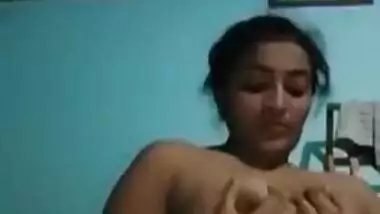 Indian love allows her sex fans to see these XXX melons under a fan