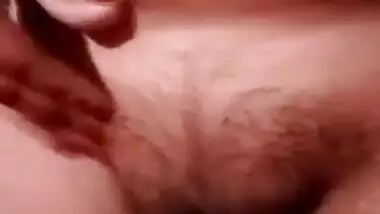 Chubby Desi woman with round tits gently touches own hairy XXX muff