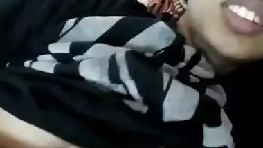 Young Indian woman with big sex eyes flashes her XXX tits in bed