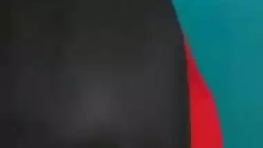 Desi female in a long black skirt exposes legs and boobies in sex show