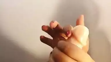 Desi woman receives sexual pleasure riding XXX toy with shaved pussy