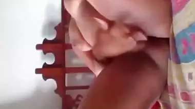 Indian girl playing guitar on pussy