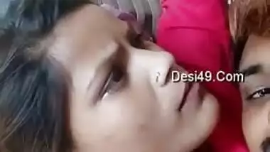 Young Desi woman is lying in bed with XXX lover kissing her on camera
