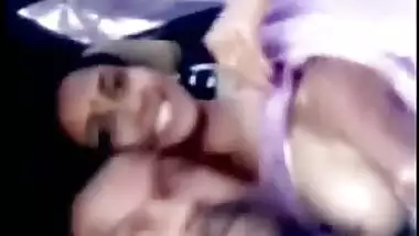 Indian girl in a purple sari exposes her titties for guy in his car in POV porn