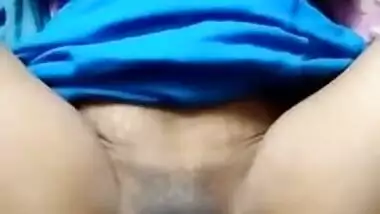 Indian chick spreads her sex legs wide so that XXX hole can be seen