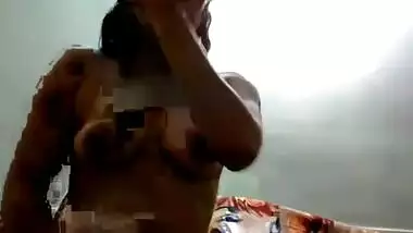 Masked Indian chick in green panties acts on webcam instead of porn