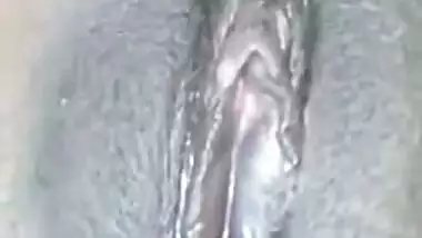 Amateur Desi gal shows she is ready for sex by touching bald XXX twat