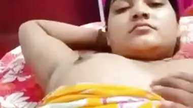 Desi fatty poses in XXX clip with young man who plays with her tits