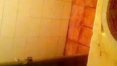 Girl spying on her stepmom having nude bath