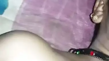 Desi XXX wife shows off naked body and fools around lying on her back