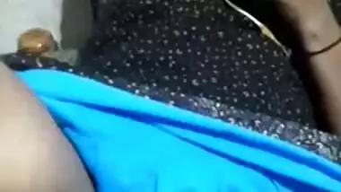 Whore is talking on the phone while lover is touching her Desi vag